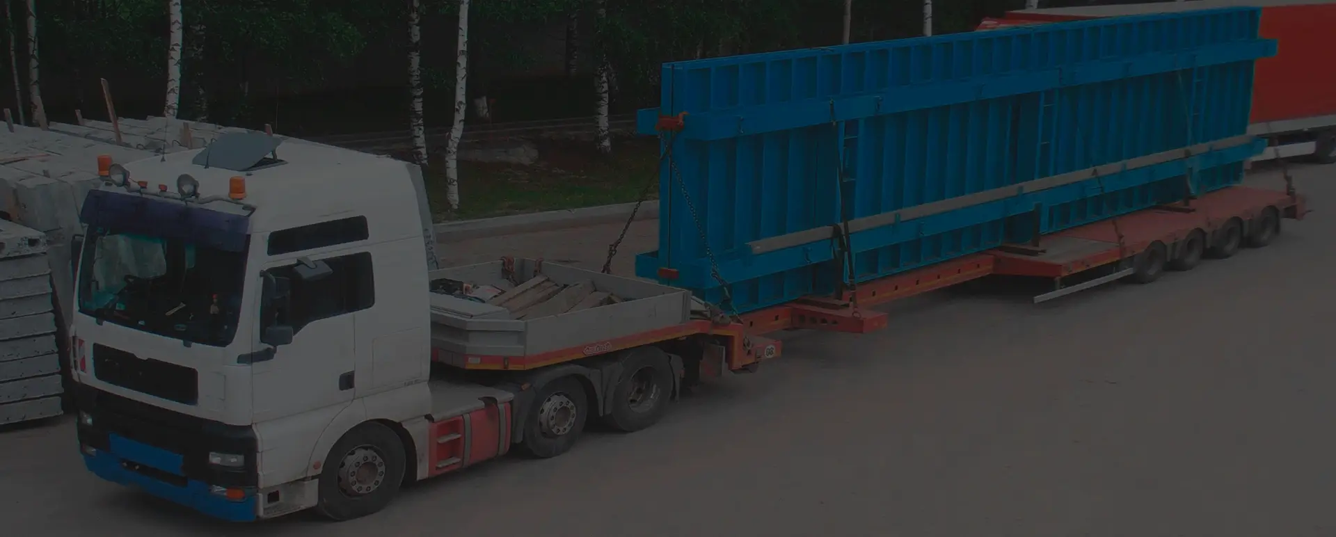 Выгодная доставка грузовым тралом по пути следования основного груза в городе Тында (Дальневосточный округ - Амурская область)